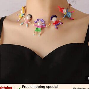 Whimsical Beaded Necklace with 5 Beaded Children on It